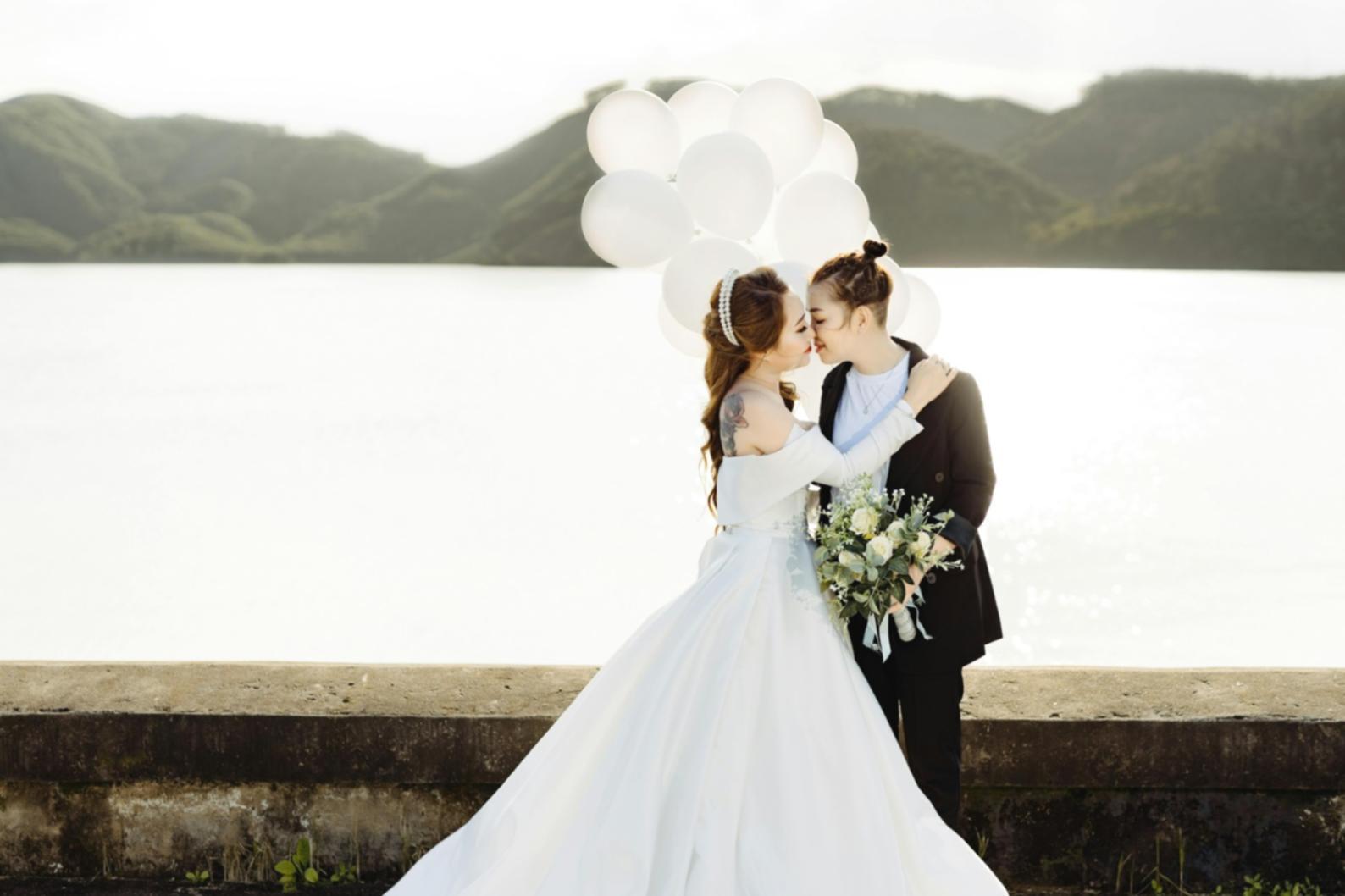 Outdoor reception space featuring traditional Thai elements mixed with contemporary design